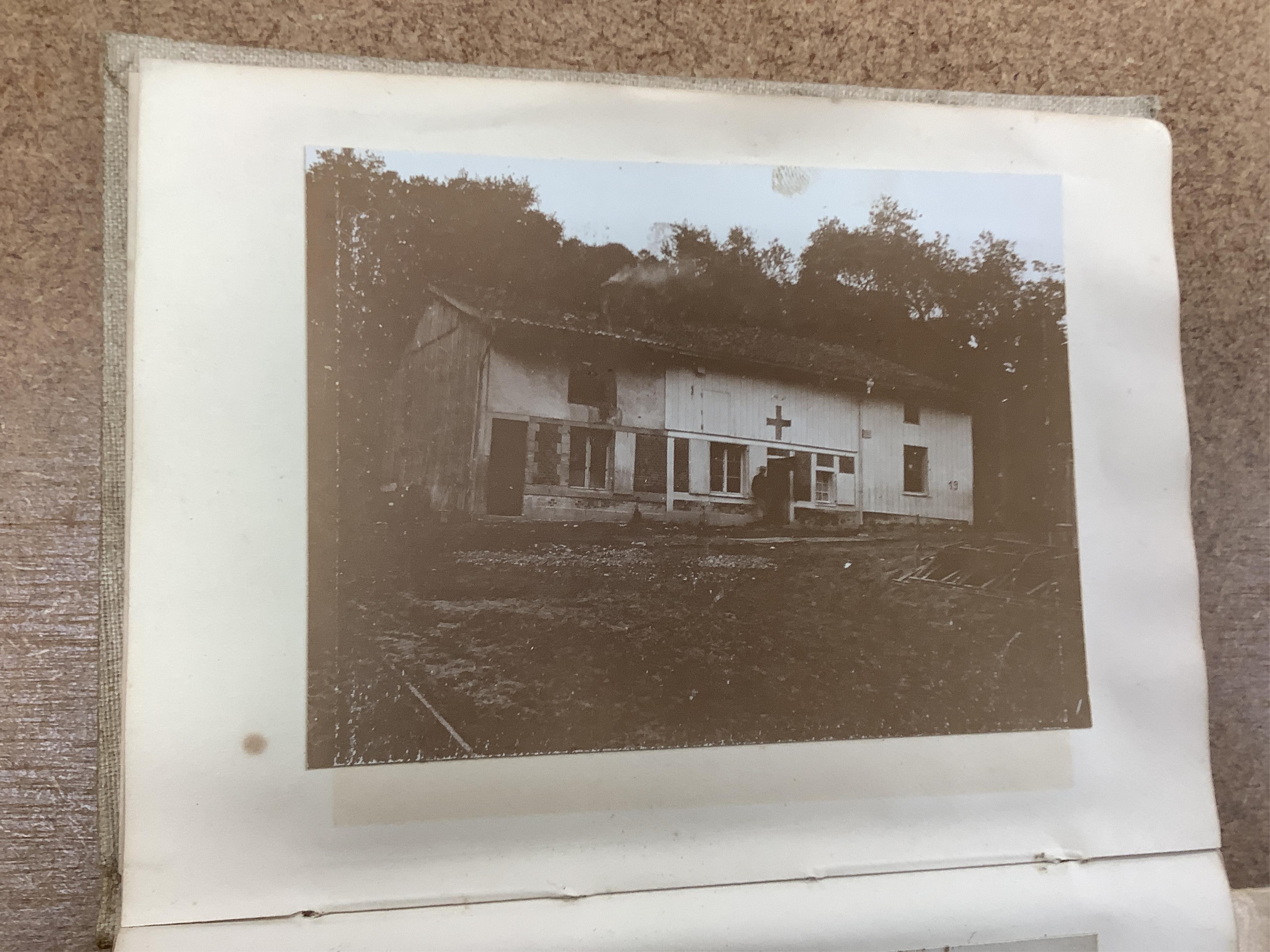 A WWI Ambulance and Balloon Brigade photograph album, pocket watch, coin, etc. Condition - fair, pocket watch ticks when wound